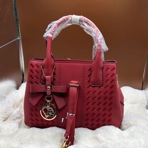 Small purse cross body 11 1/2” long 8” high 4” width